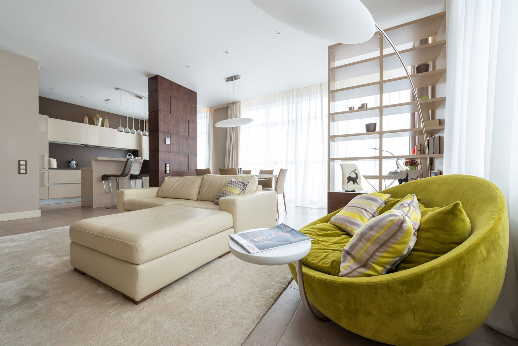 Elements included in a SpazioLiv modern living room: seating, tables, media units, walls and lighting