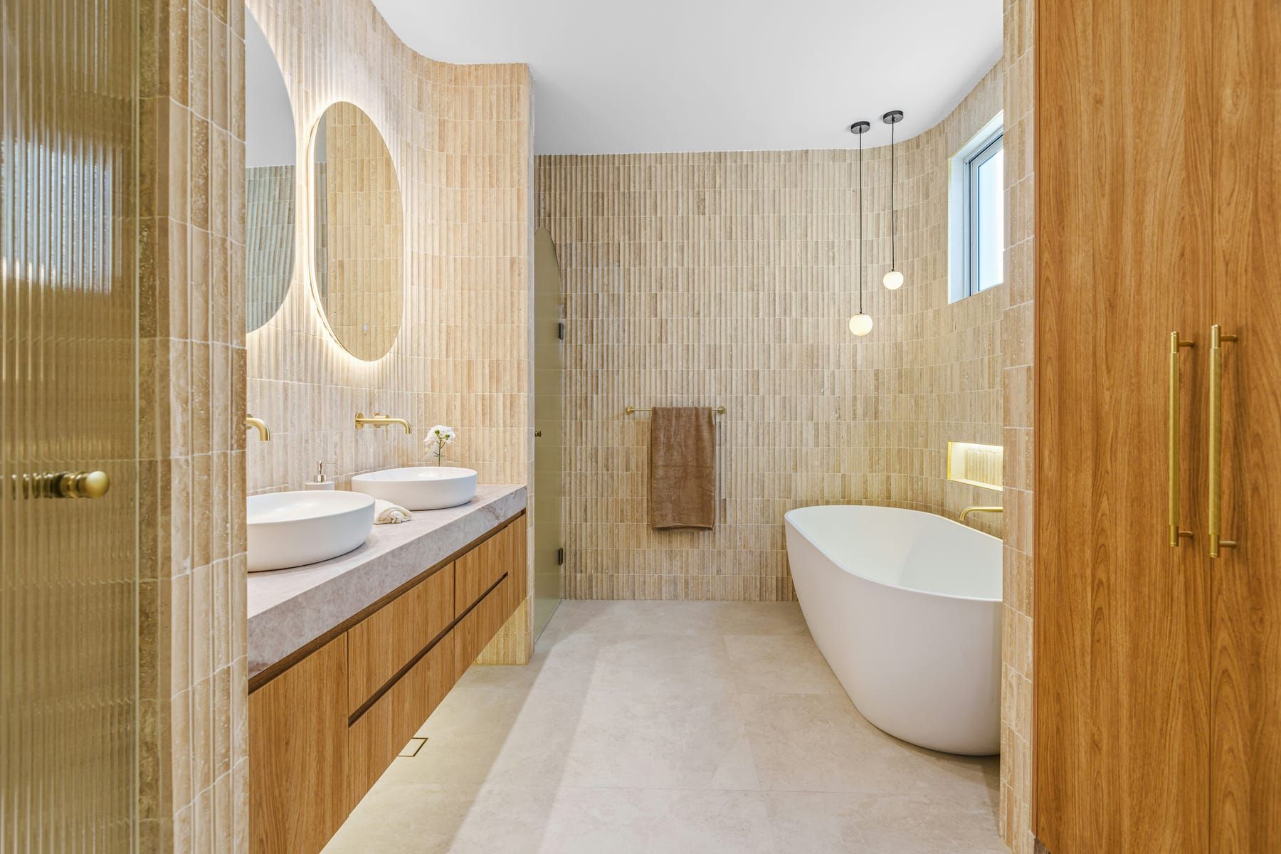 Vanity, shower area and fittings included in a SpazioLiv bathroom