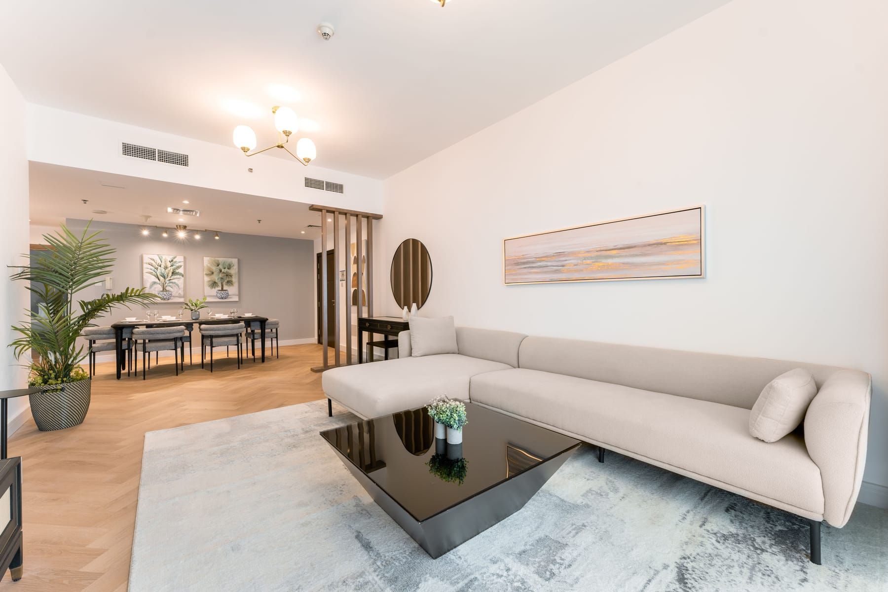 Living area, dining area and finish elements of an open plan interior