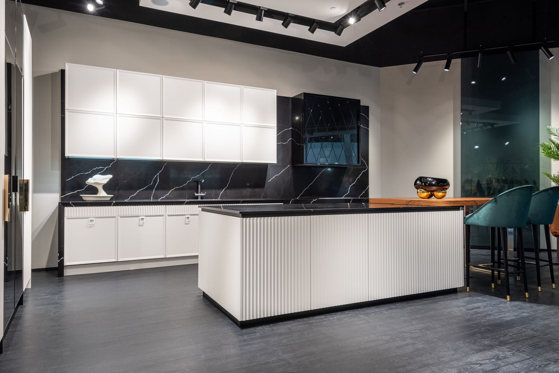 Elements included in a SpazioLiv island kitchen: cabinetry, countertops, appliances, lighting and accessories
